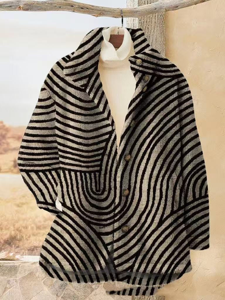 Striped coat with turtleneck on hanger.