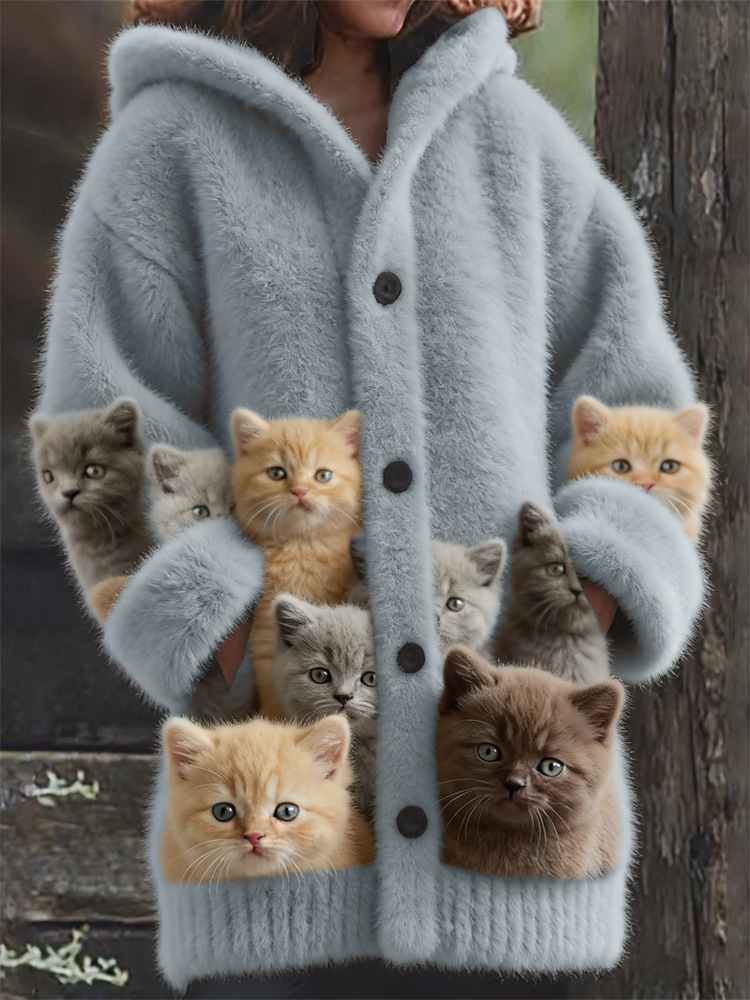 Cozy coat filled with cute kittens.