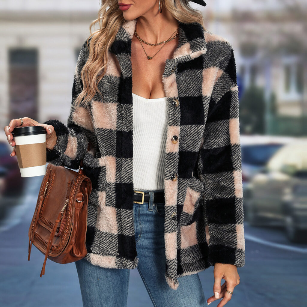 Woman in plaid coat holding coffee cup.