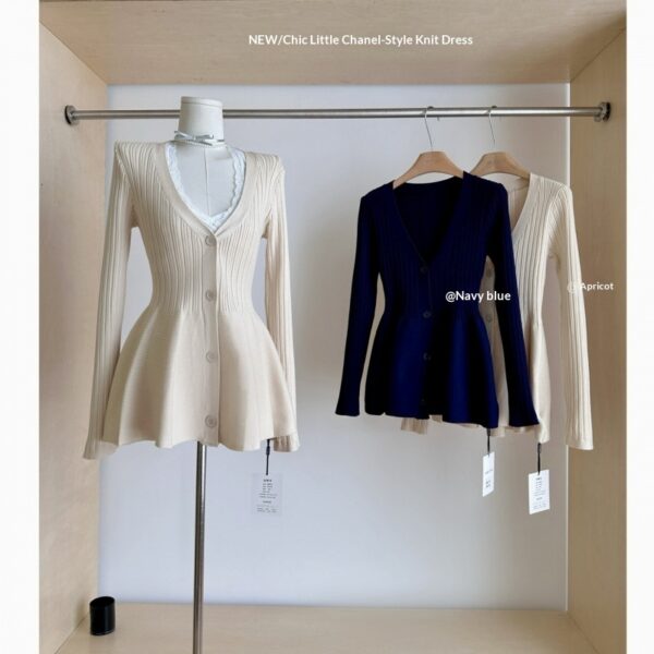 Three knit dresses on display stand.