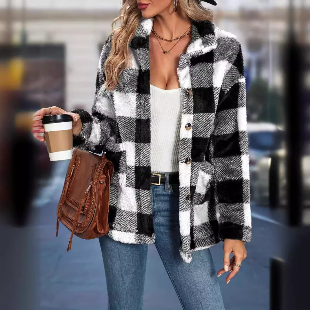 Woman in checkered coat with coffee.