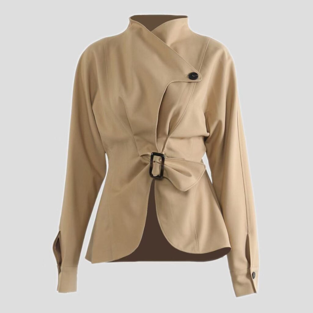Tan asymmetrical jacket with buckle detail.