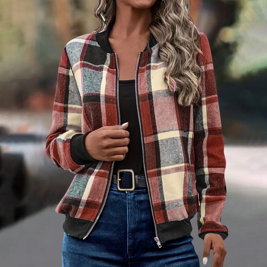 Woman in plaid jacket and jeans.