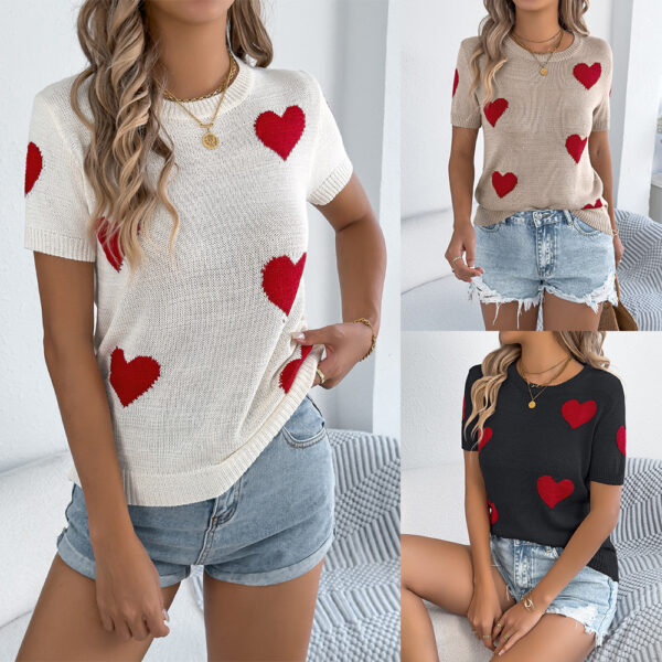 Women in heart-patterned sweaters and shorts.