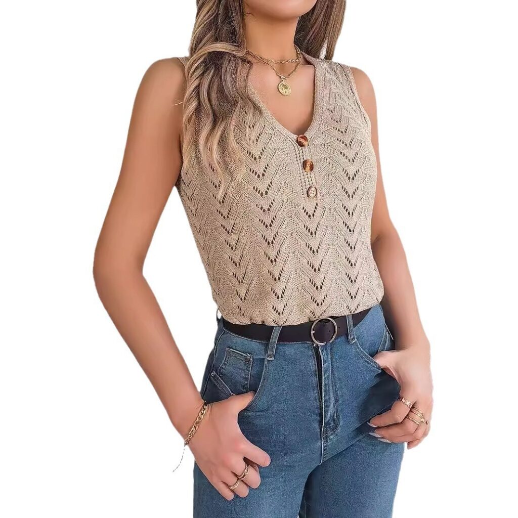Woman wearing knitted top and blue jeans.