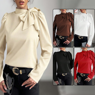 Women's tops in various colors with bow.