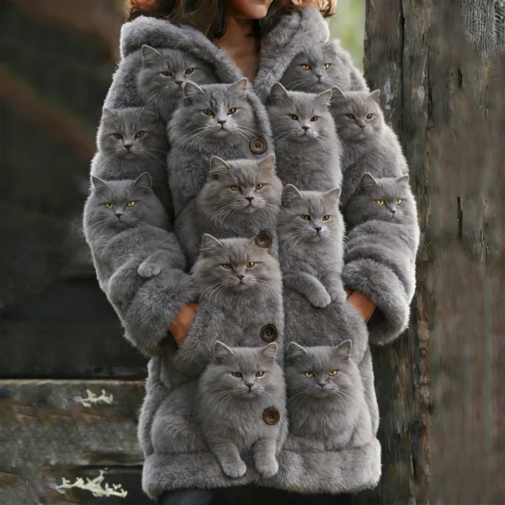 Woman wearing coat made of cat images.