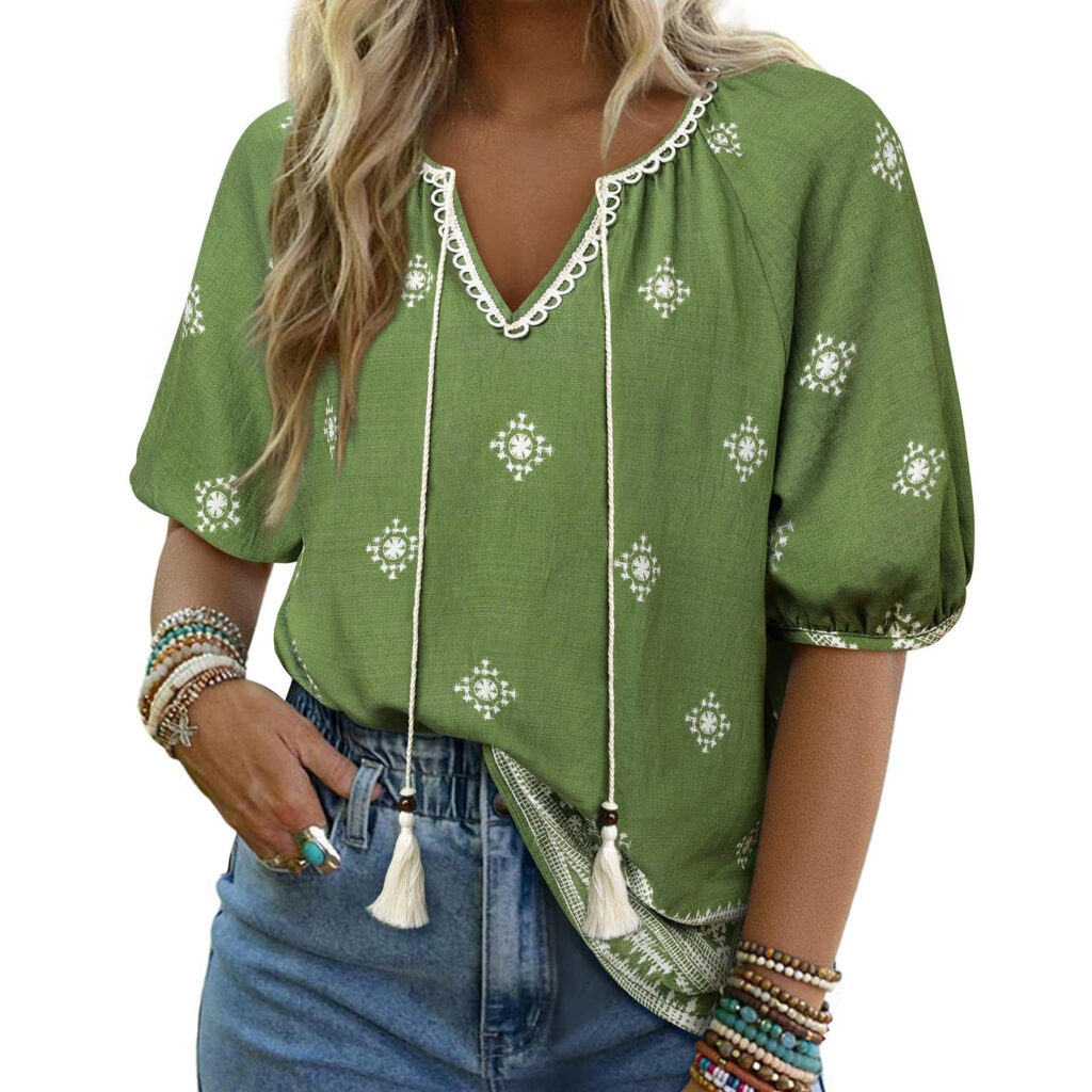 Woman in green blouse with accessories.