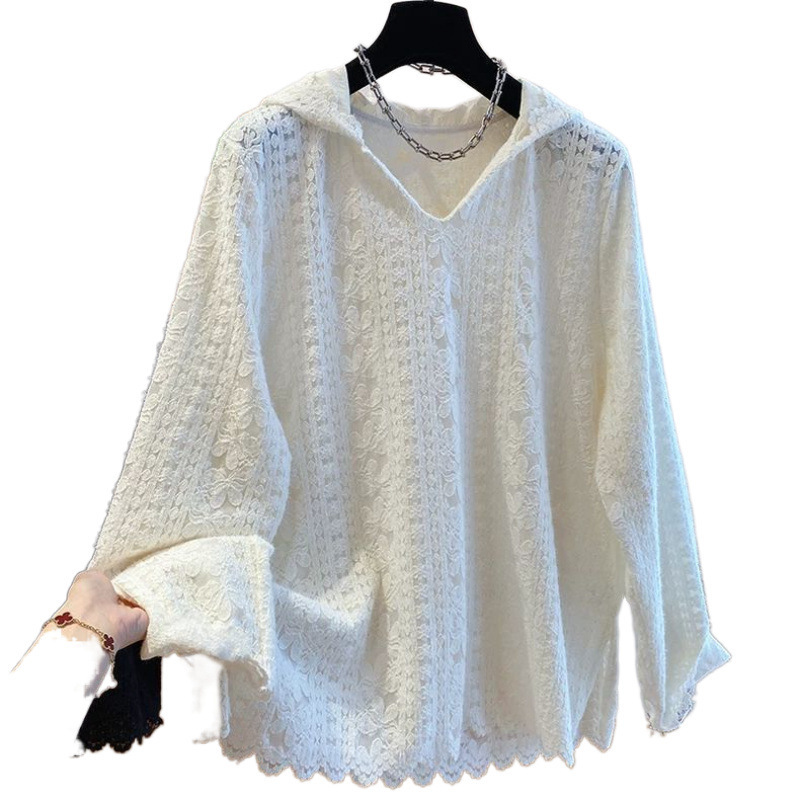 White lace hooded sweater with textured design.