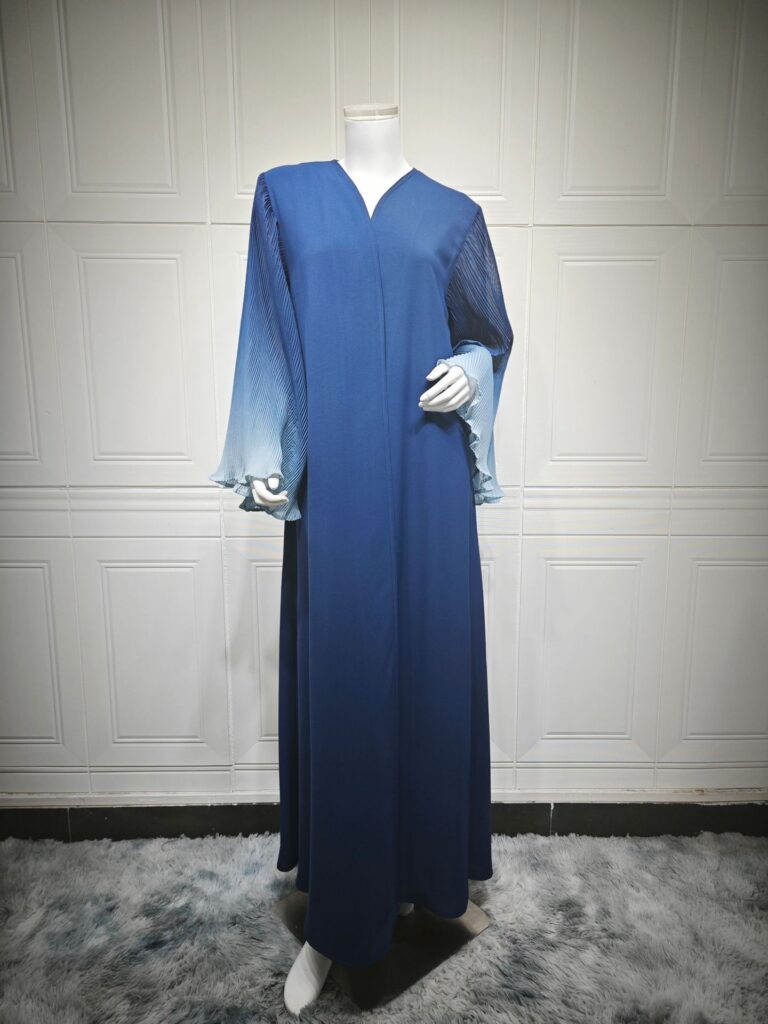 Blue long-sleeve dress on mannequin display.