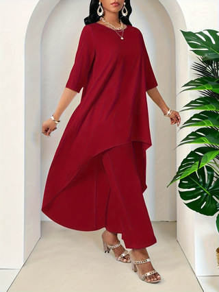 Woman in red dress with jewelry.
