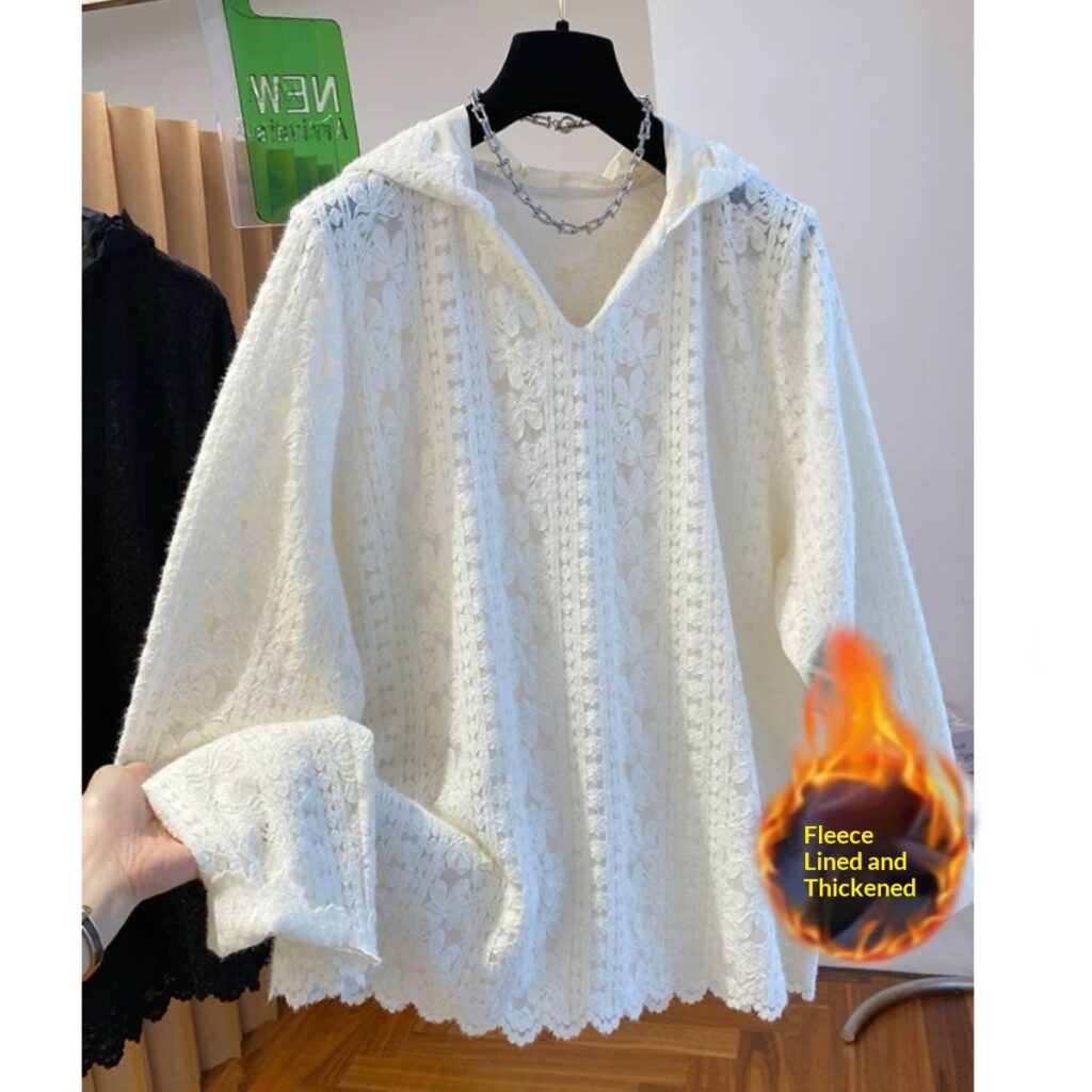 White lace sweater with fleece lining displayed.
