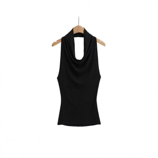 Black sleeveless top on wooden hanger.