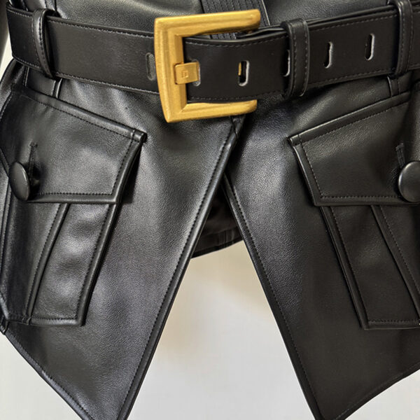 Black leather jacket with gold belt buckle.