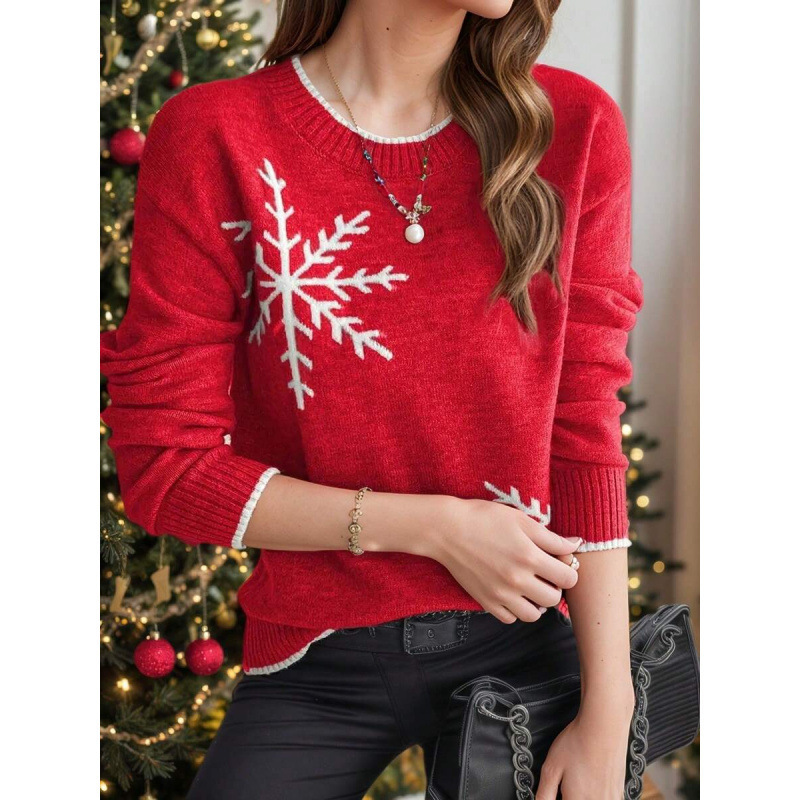 Woman in red snowflake sweater, Christmas tree.