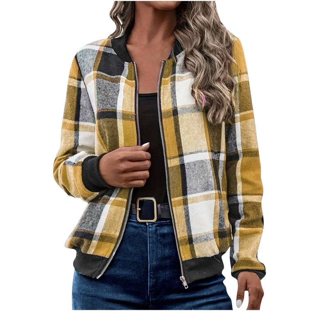 Woman wearing yellow plaid jacket and jeans.