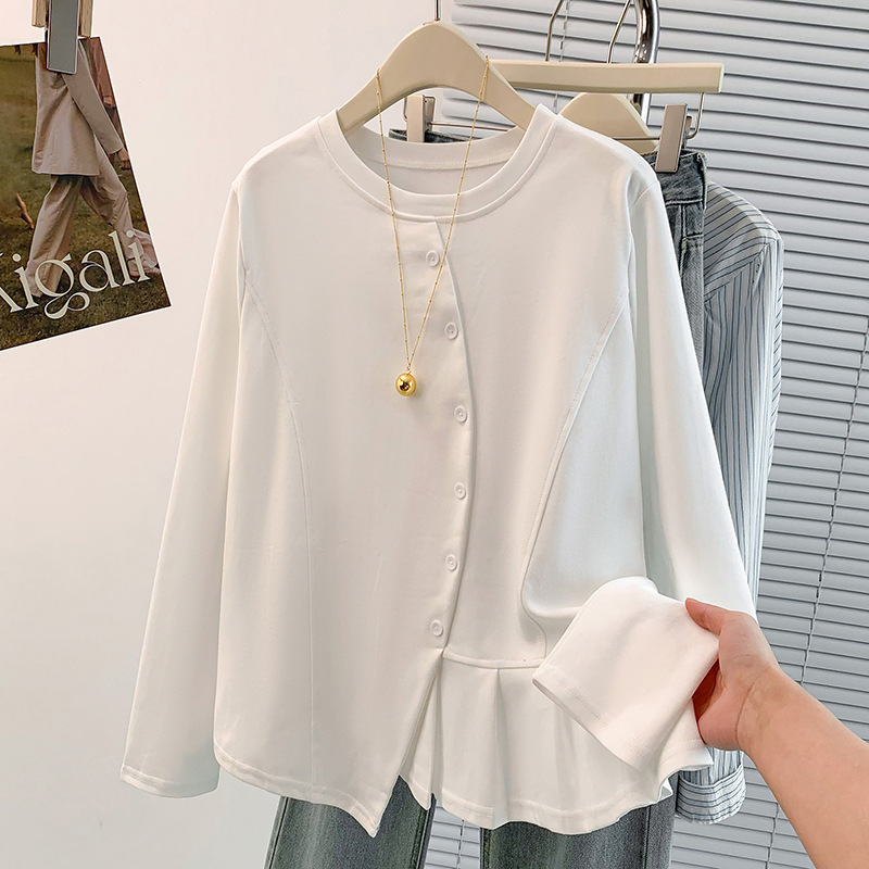 White button-up shirt on hanger.