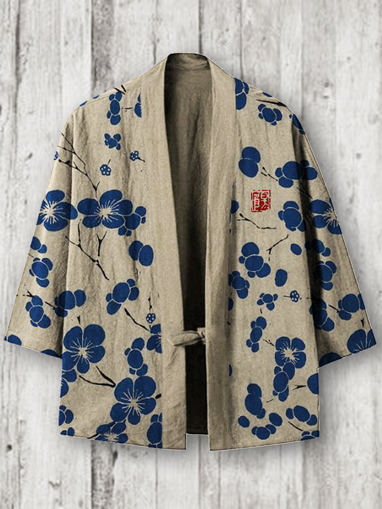 Beige kimono with blue floral design.
