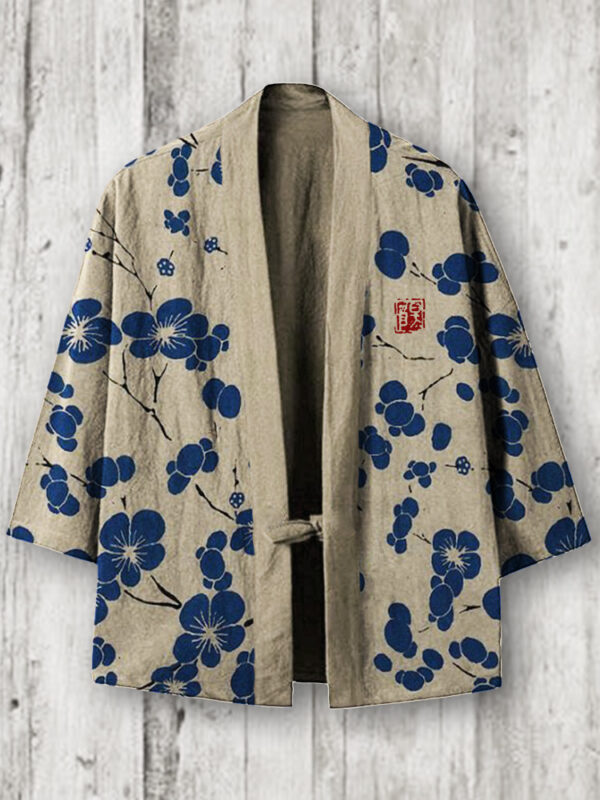 Blue floral kimono on wooden background.