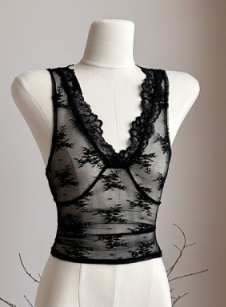 Black lace top on a mannequin.
