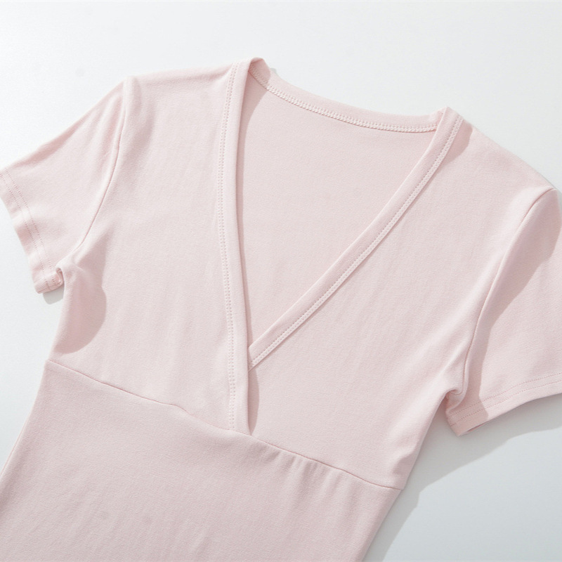 Light pink V-neck T-shirt on display.