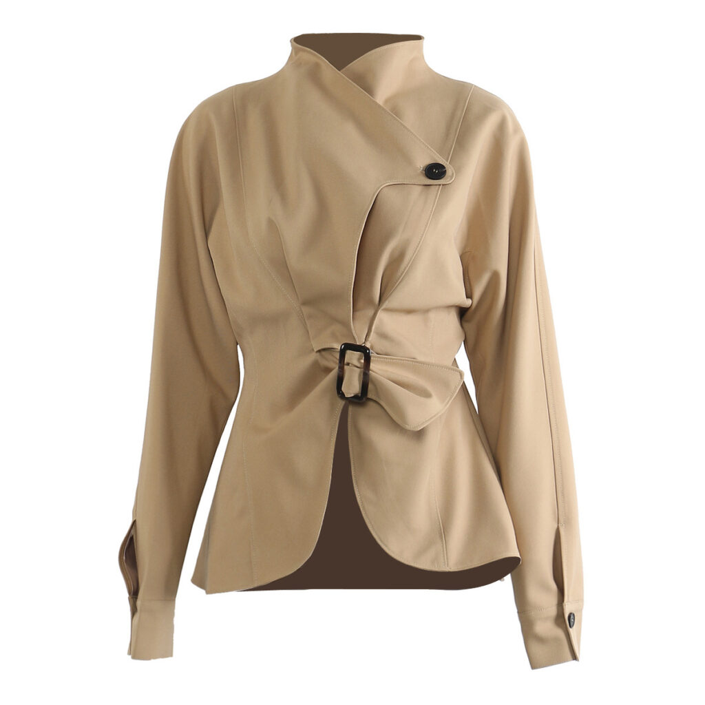 Beige asymmetrical jacket with buckle detail.