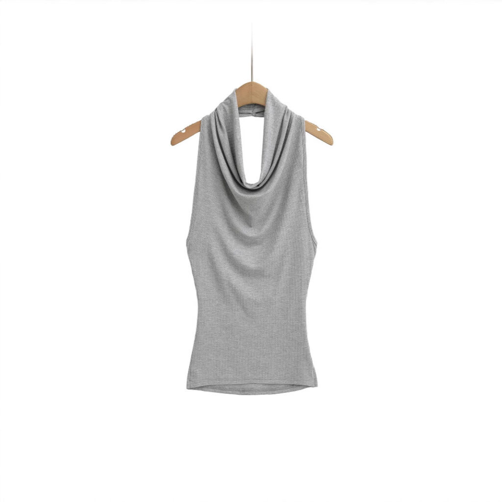 Gray sleeveless top on wooden hanger.
