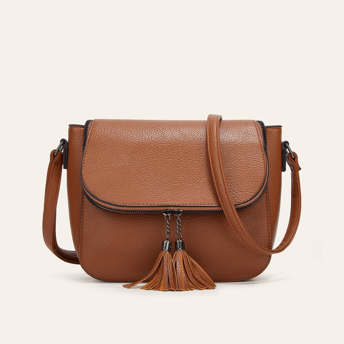 European And American-style Fashionable Flip-top Saddle Bag With Tassels - Image 1
